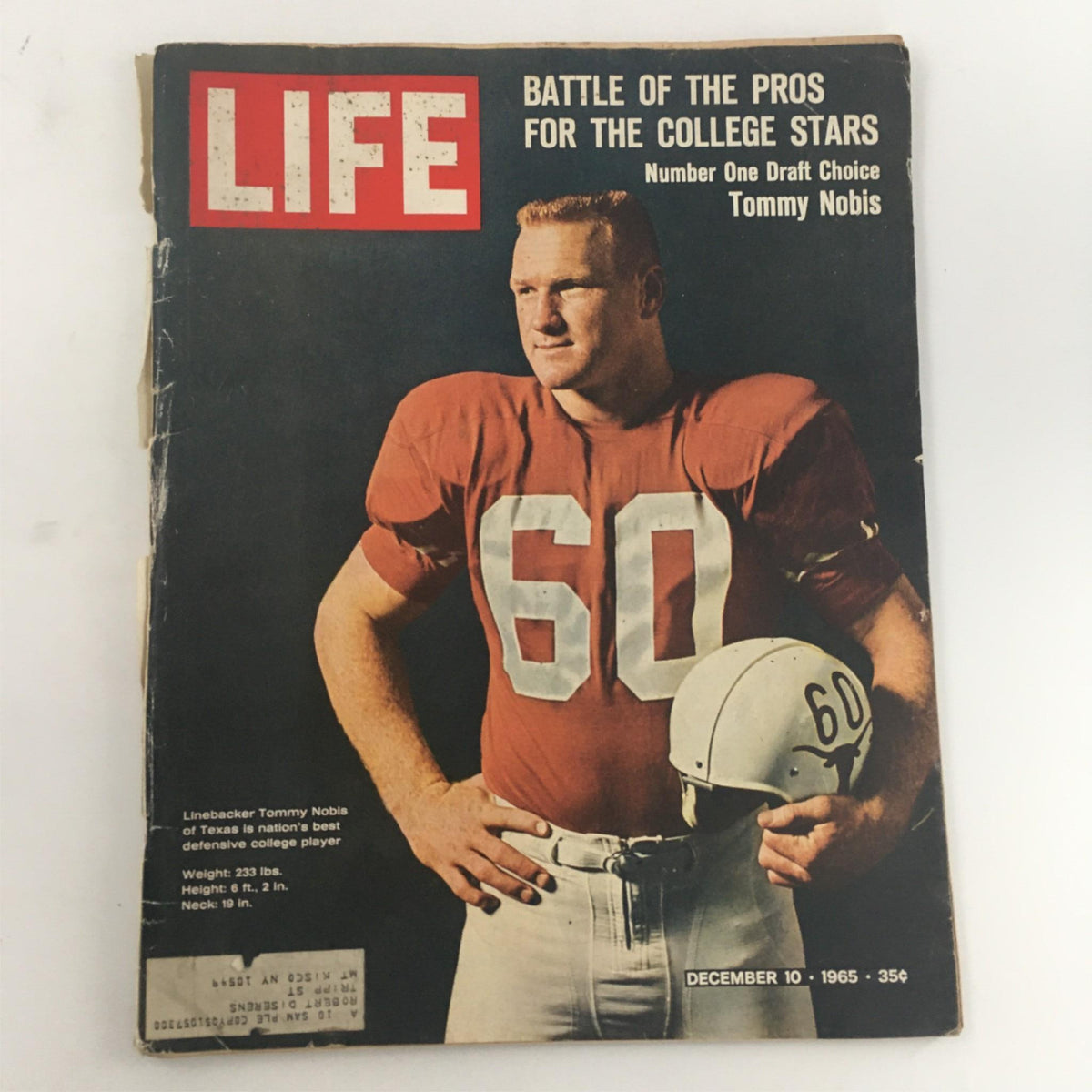 Vintage Life Magazine cover from December 10, 1965, featuring Number One Draft Choice Tommy Nobis in a football jersey, highlighting a pivotal moment in sports history.