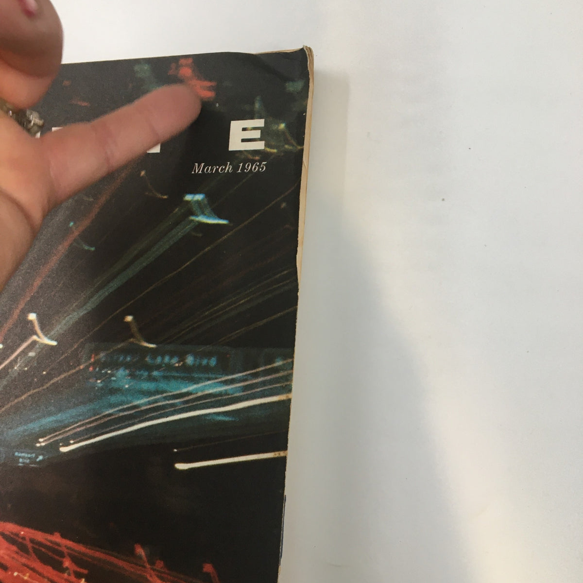 Side view of the cover of VTG Fortune Magazine March 1965 showcasing the title 'Los Angeles Prototype of the Supercity' with abstract light patterns.