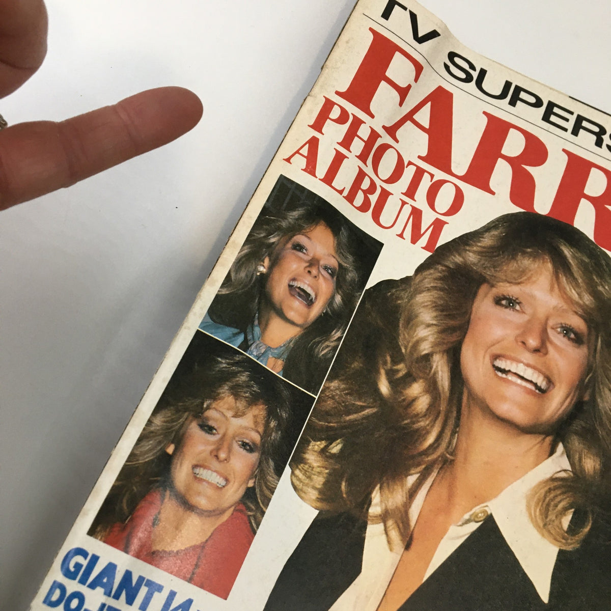 Close-up of the VTG TV Superstar Magazine October 1977 cover featuring Farrah Fawcett, highlighting her radiant smile and the text about the photo album.