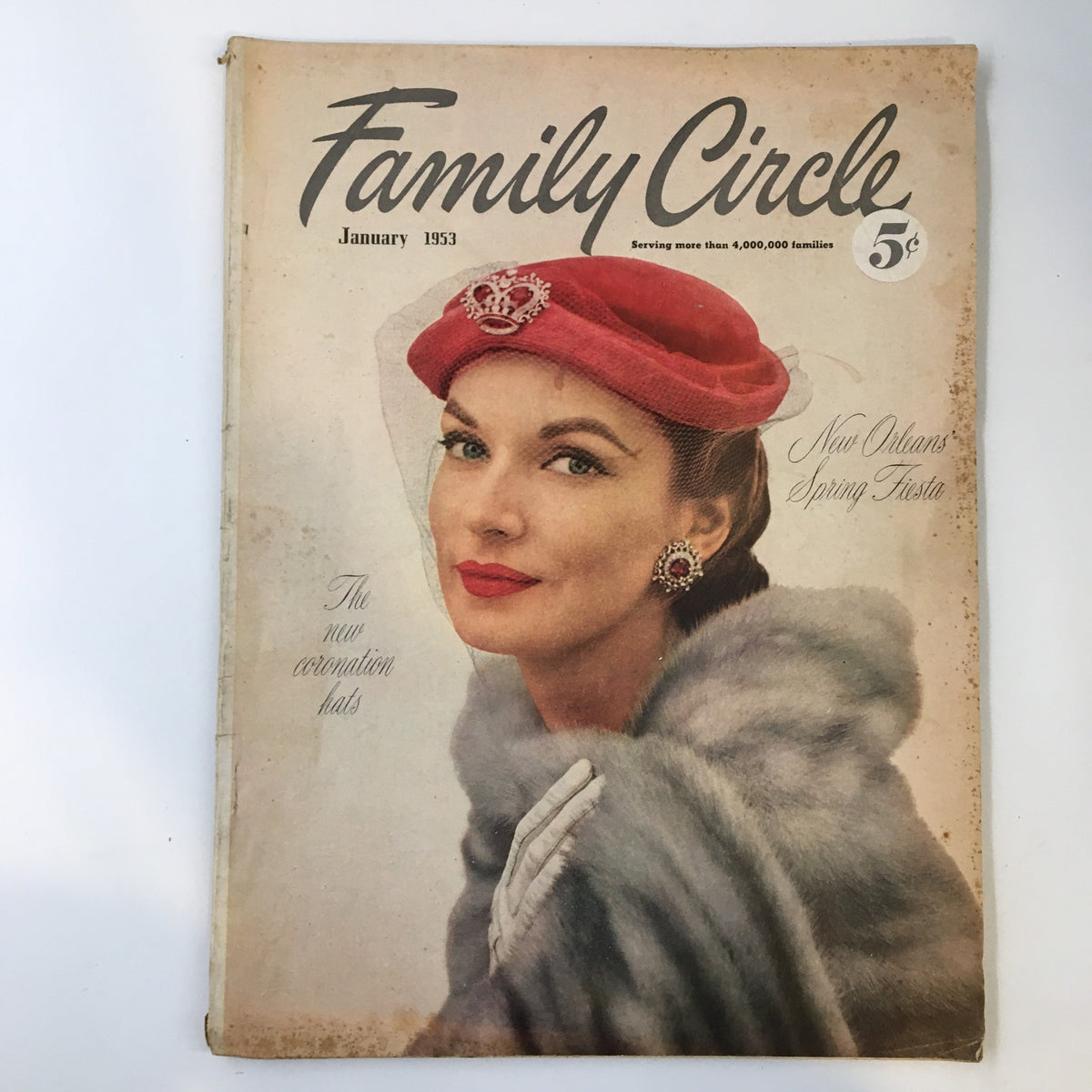 Cover of VTG Family Circle Magazine January 1953 featuring a woman in a red hat and fur coat, promoting the theme of New Orleans' Spring Fiesta and showcasing vintage mid-century fashion.