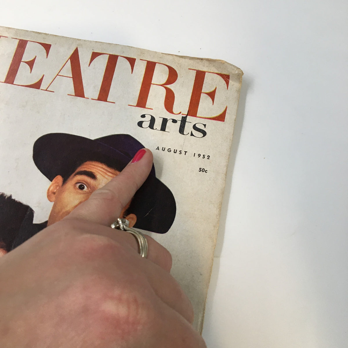 Close-up of the August 1952 Theatre Arts Magazine cover, highlighting the title and the colorful imagery associated with the issue 'New Faces Stop Their Own Show'.