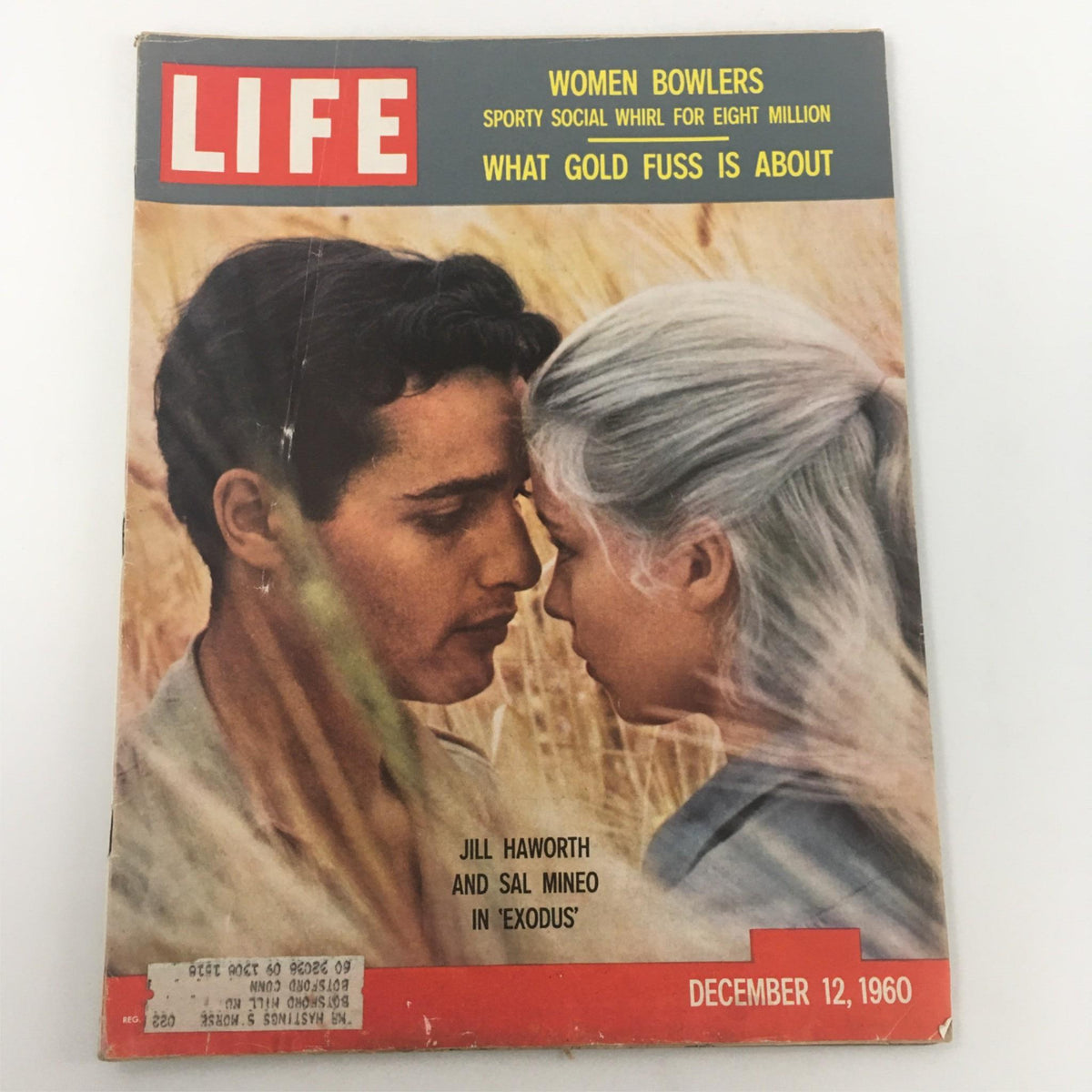 Vintage Life Magazine cover from December 12, 1960, featuring Jill Haworth and Sal Mineo in Exodus, showcasing a romantic moment between the two stars against a field background.