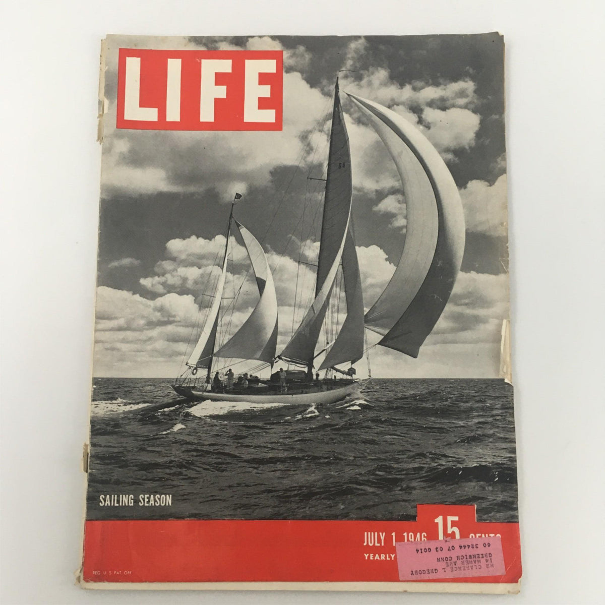Vintage Life Magazine cover from July 1, 1946, highlighting Yacht Mandoo II amidst a sailing season scene, displaying a sailboat with billowing sails.