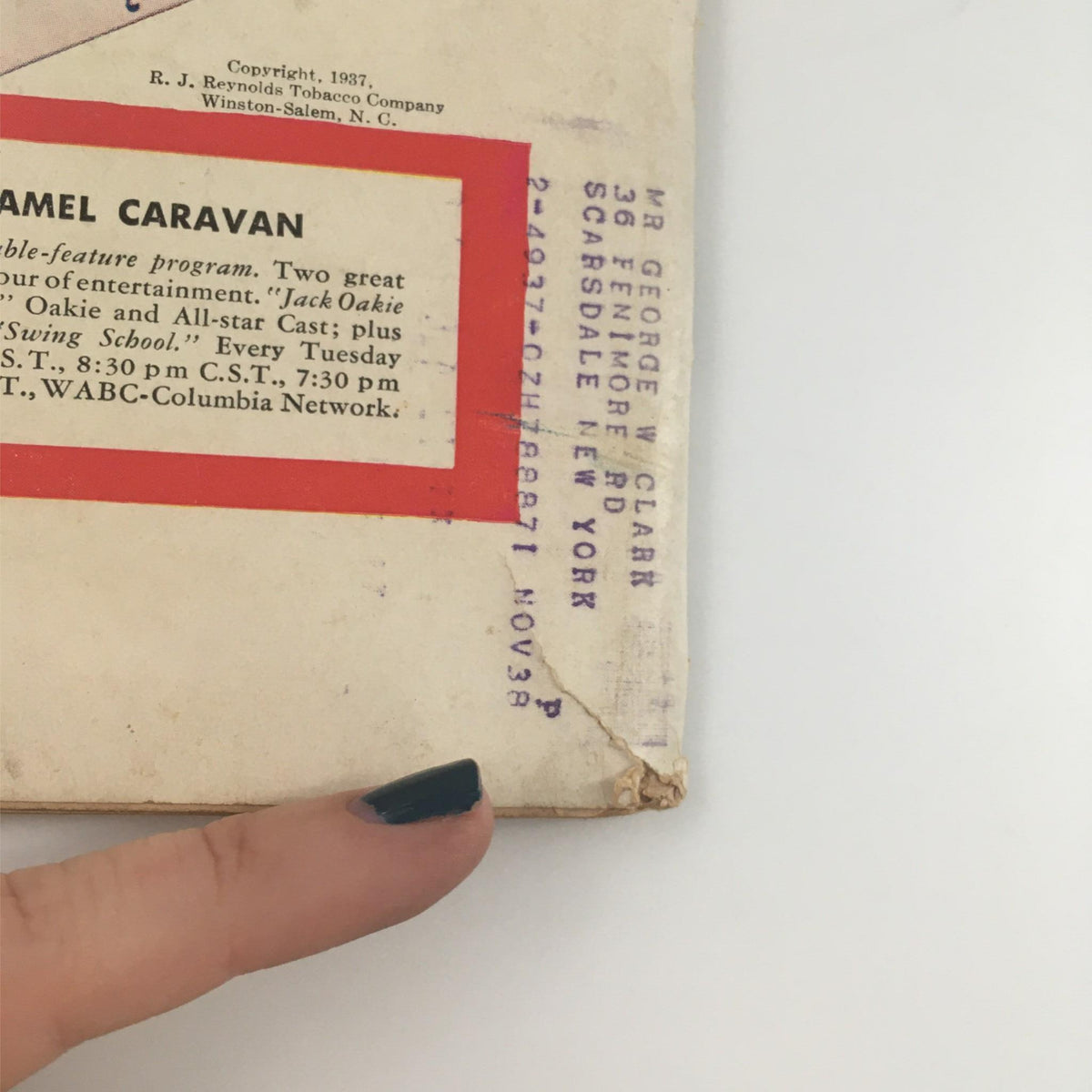 Back cover of VTG Life Magazine December 6, 1937, featuring advertisement for Camel Caravan program and minor signs of wear like a handwritten address label.
