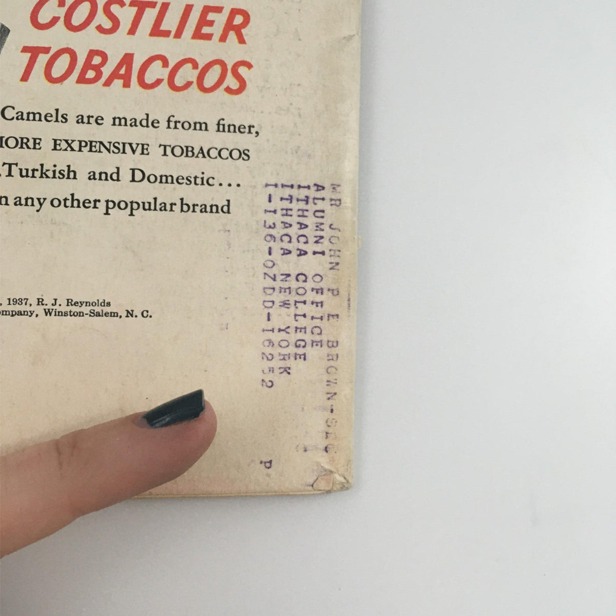 Side view of VTG Life Magazine February 1, 1937, showing the address label and advertisement for Camel cigarettes, emphasizing the magazine's vintage appeal.