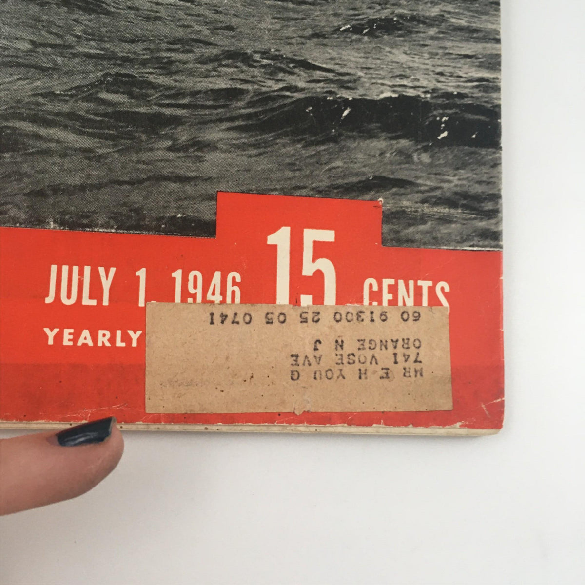 Close-up of the July 1, 1946 issue of Life Magazine featuring the yacht Mandoo II. The cover shows a price of 15 cents and includes a shipping label, reflecting its vintage nature and significance in maritime history.