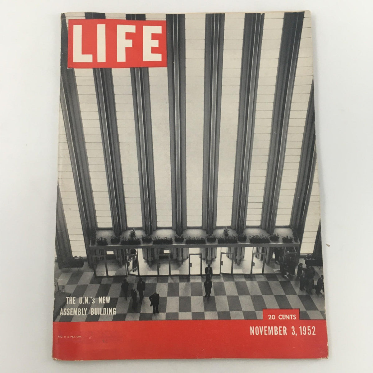 Cover of Life Magazine dated November 3, 1952, featuring 'The U.N.'s New Assembly Building' with iconic architecture elements and people at the entrance.