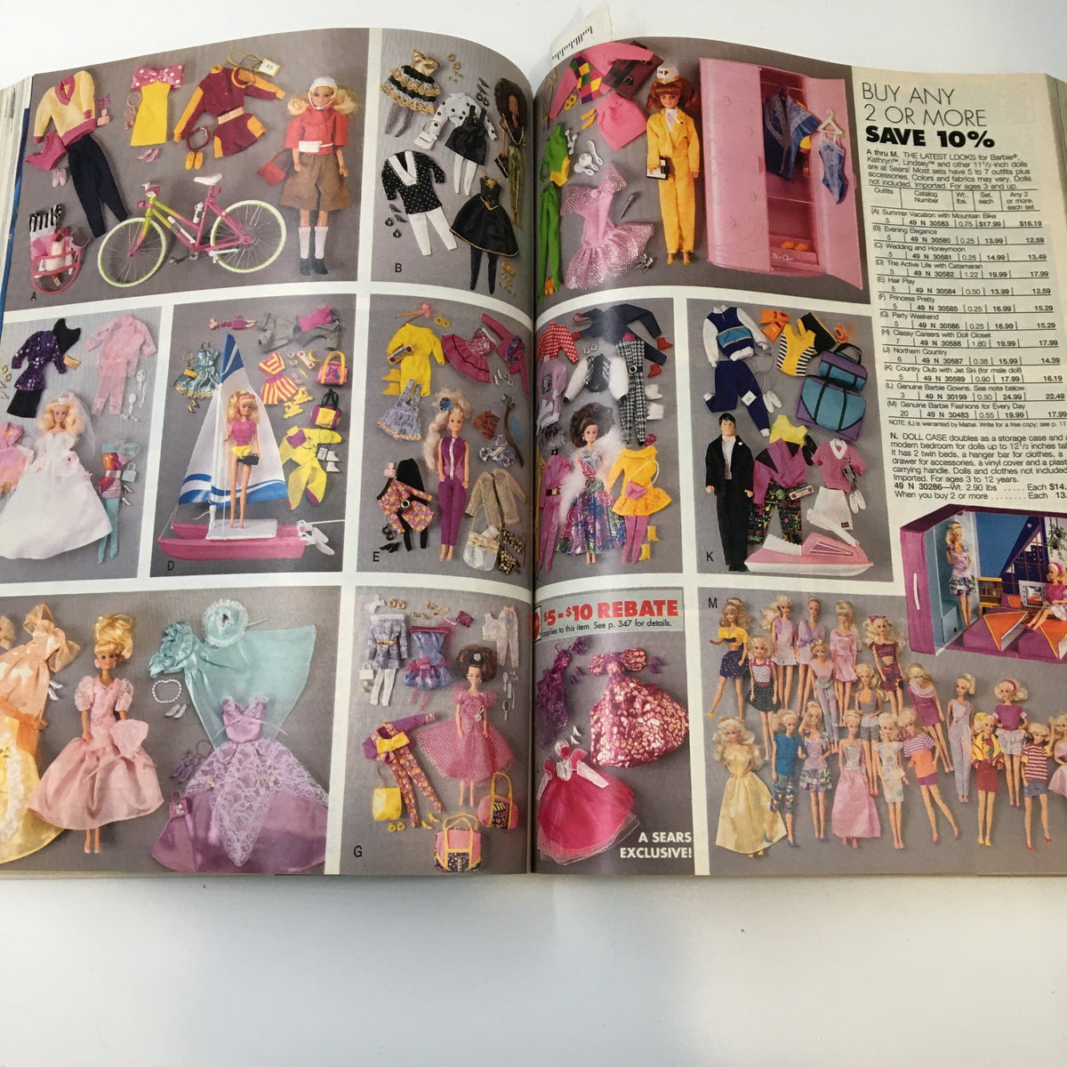 1992 Sears The Great American Wish Book Catalog page featuring Barbie dolls and an array of colorful outfits and accessories, promoting a discount offer for purchasing multiple items.
