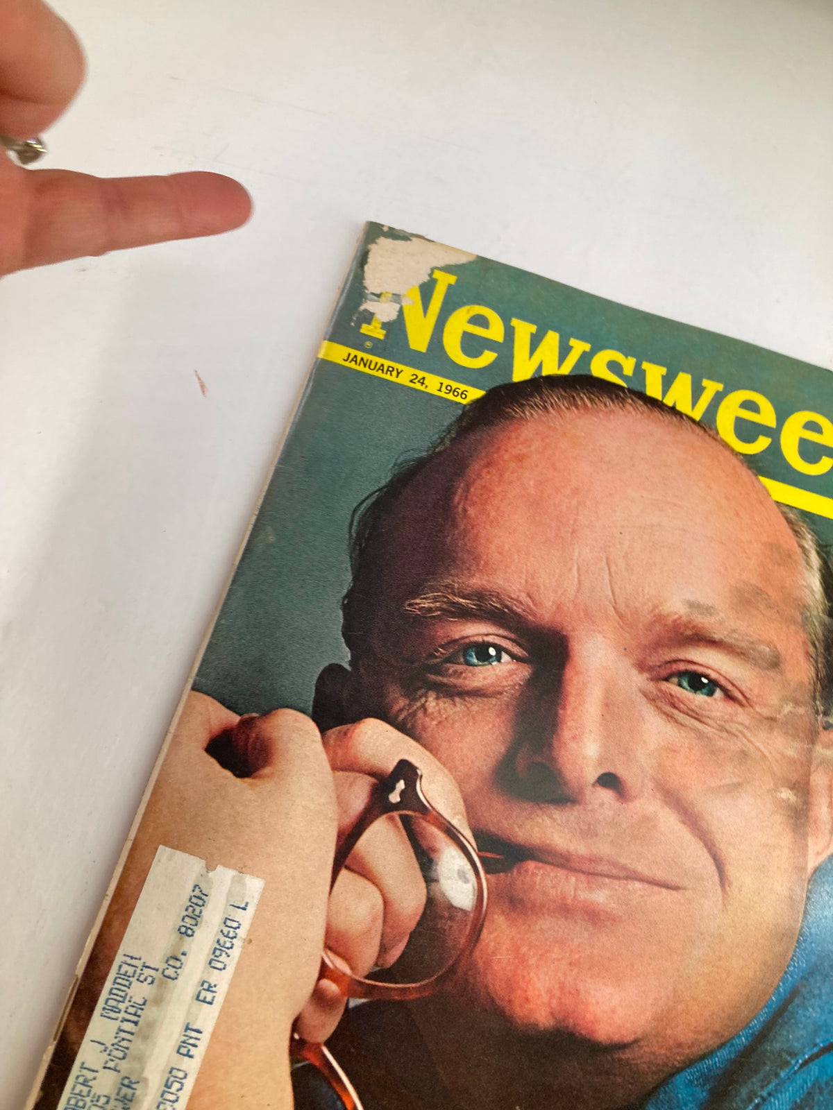 Close-up of the vintage Newsweek magazine cover from January 24, 1966, showcasing 'In Cold Blood' by Truman Capote. Includes visible editorial labels on the cover and a signature style photograph of Capote.
