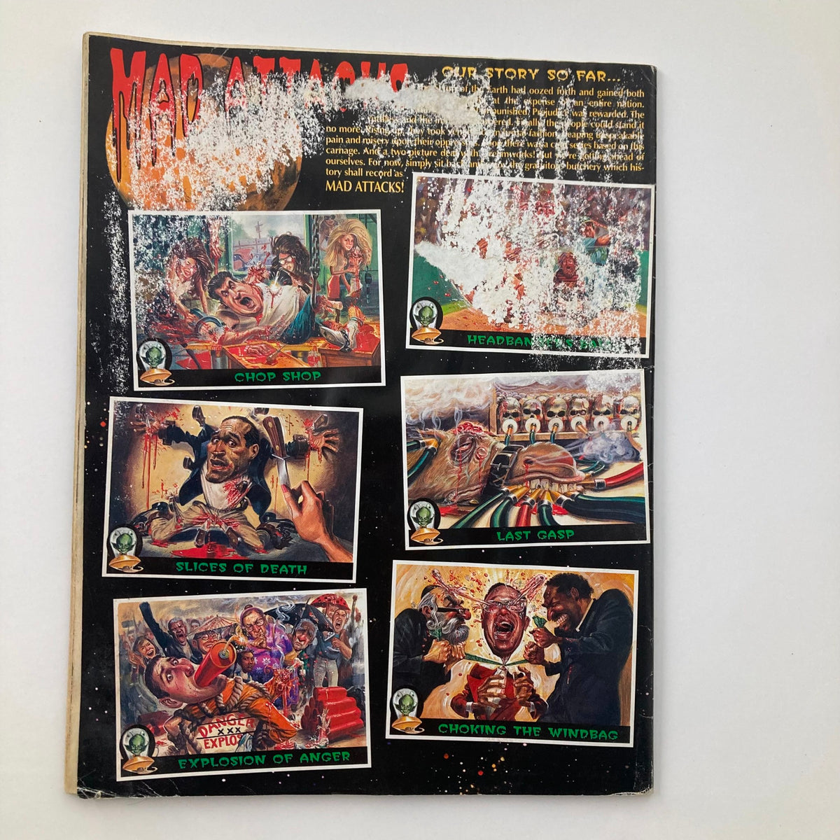 Back cover of Mad Magazine January 1997 #353 featuring dark comic illustrations related to the 'Mars Attacks!' theme, highlighting the magazine's unique humor and artistic style.