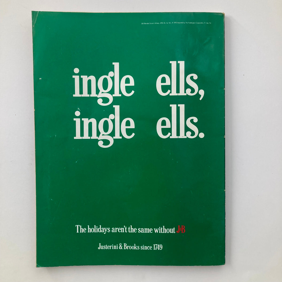 Back cover of Playboy Magazine January 1993, showcasing a simple green design with the text, providing a nostalgic touch to this collectible magazine.