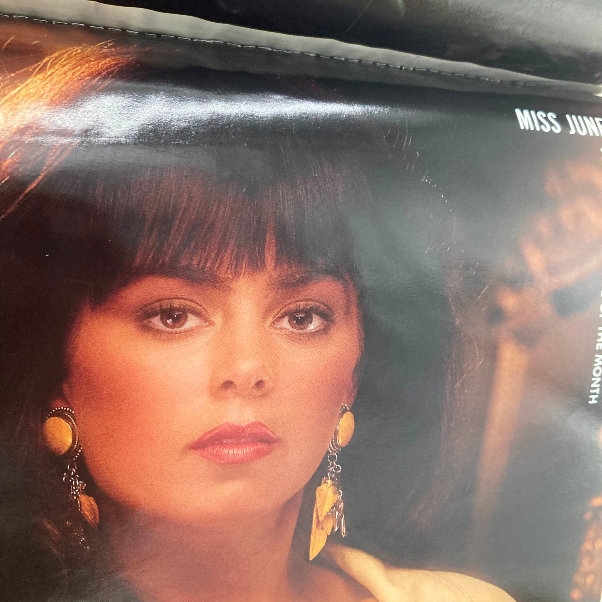 A portrait of Miss June inside VTG Playboy Magazine June 1989, highlighting vintage beauty and fashion of the era.