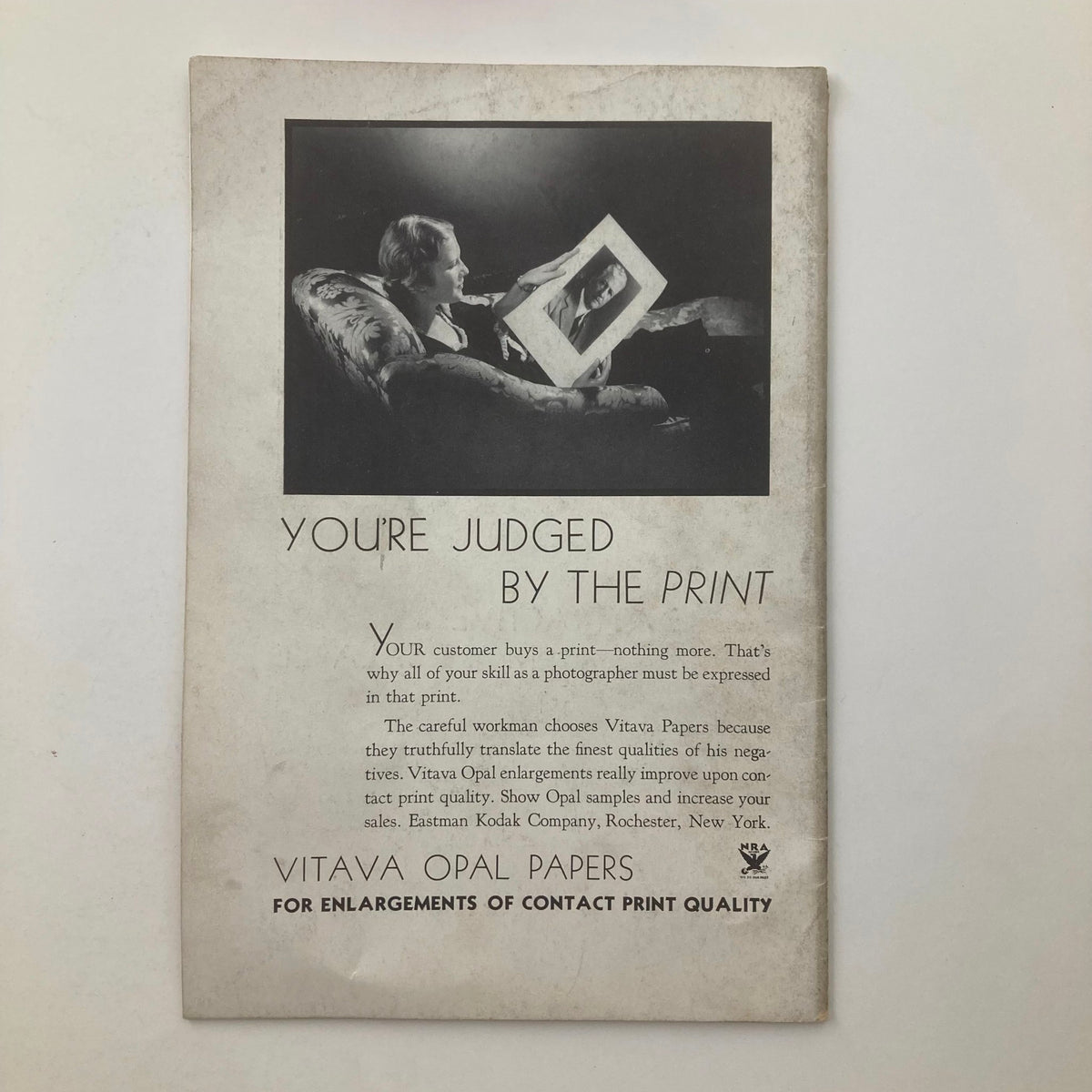 Back cover of the VTG Photographic Review Magazine February 1934, featuring an advertisement for Vitava Opal Papers, emphasizing print quality in photography.