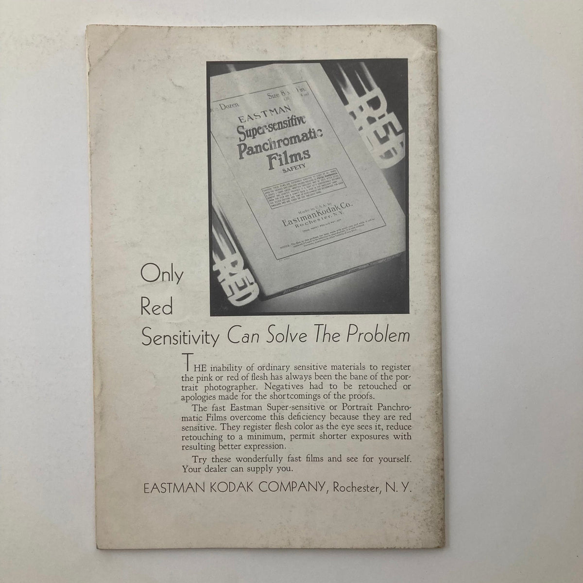 Back cover of VTG Photographic Review Magazine March 1933 advertising Eastman Supersensitive Panchromatic films with a focus on red sensitivity for photography.