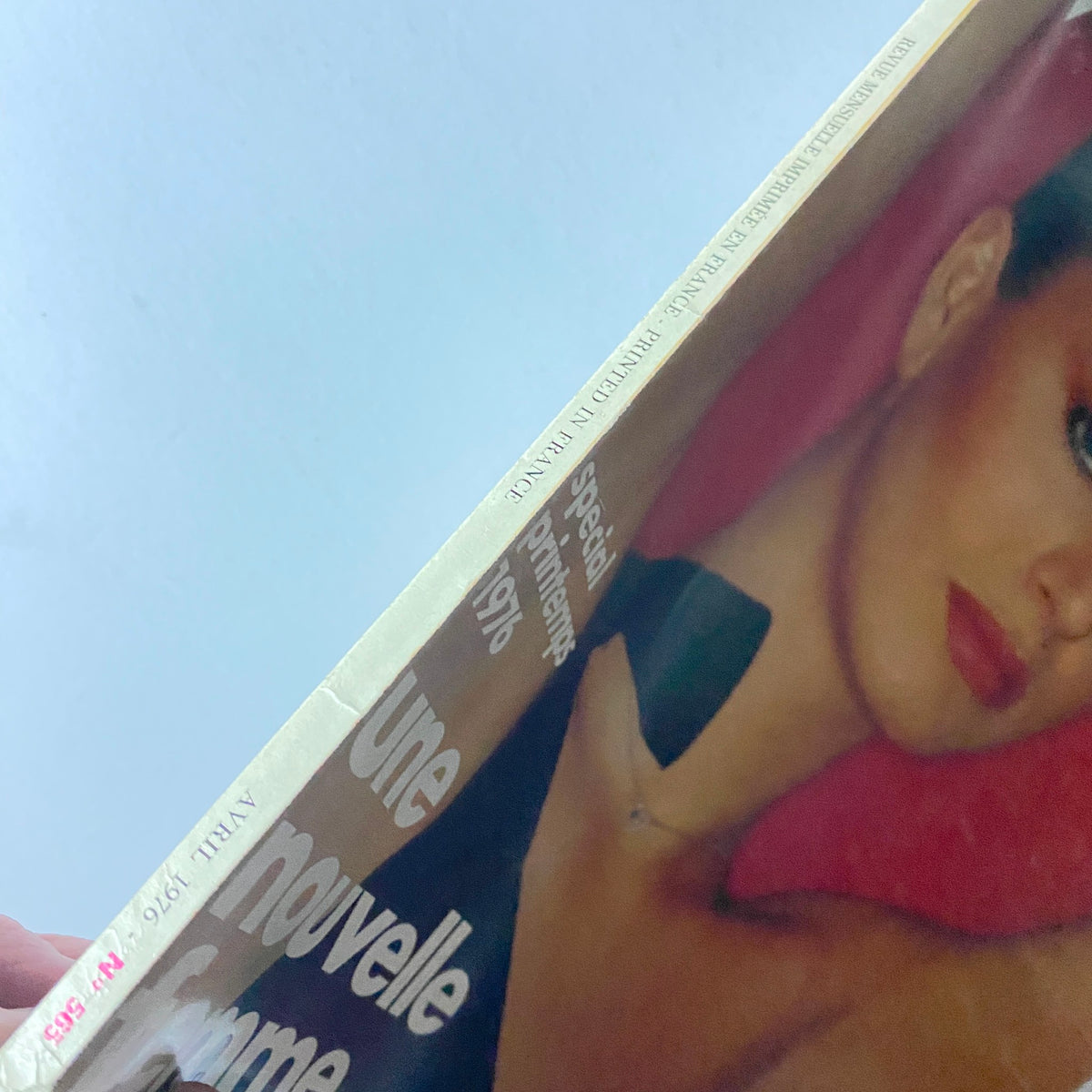 Spine view of Vogue Paris Magazine April 1976 featuring Dalila Di Lazzaro with text highlighting special editorial content from the era.