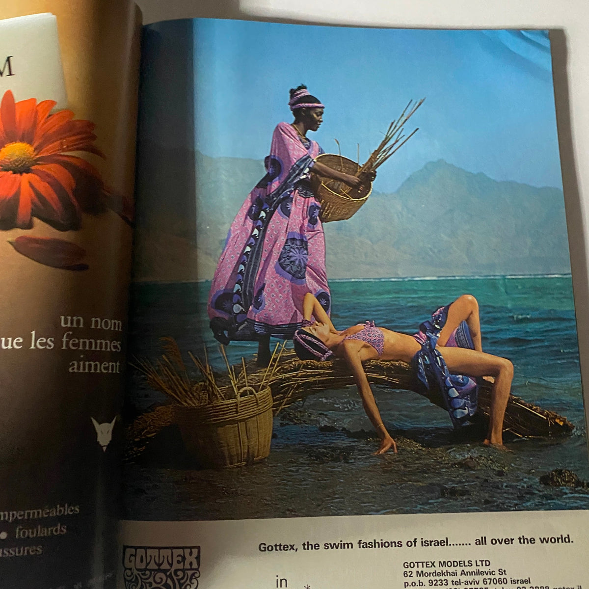 Advertisement featuring Gottex swim fashions in Vogue Paris Magazine April 1976 with Dalila Di Lazzaro on the cover, highlighting stylish swimwear on a beach.