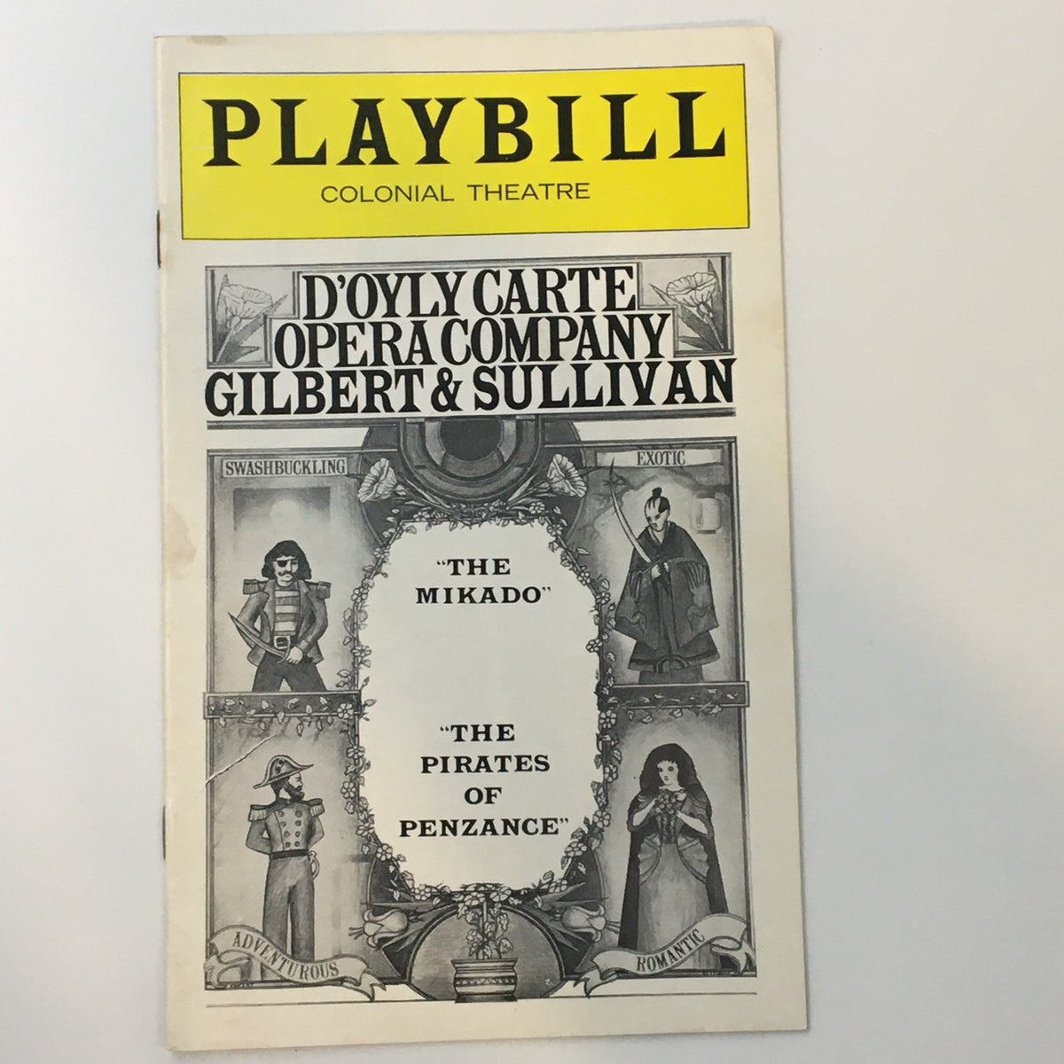 1976 Playbill from The Colonial Theatre featuring D'Oyly Carte Opera Company performing Gilbert & Sullivan's 'The Mikado' and 'The Pirates of Penzance'. Vintage collectible theatre memorabilia.