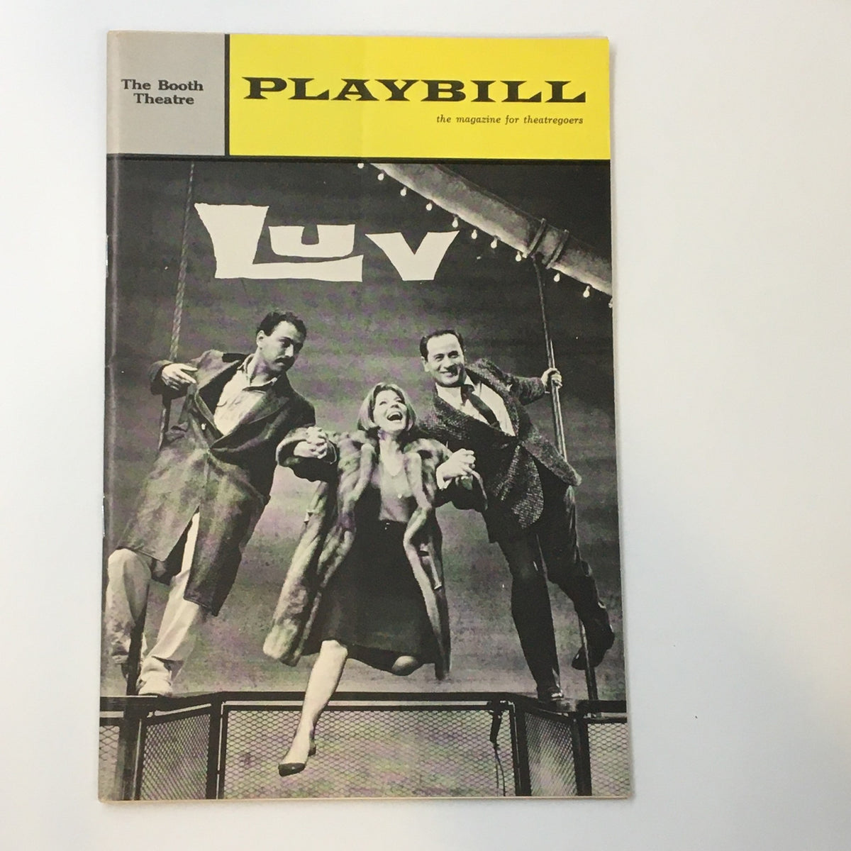 1965 Playbill from The Booth Theatre featuring Eli Wallach in the comedy 'Luv' by Murray Schisgal, showcasing a vintage theater experience.