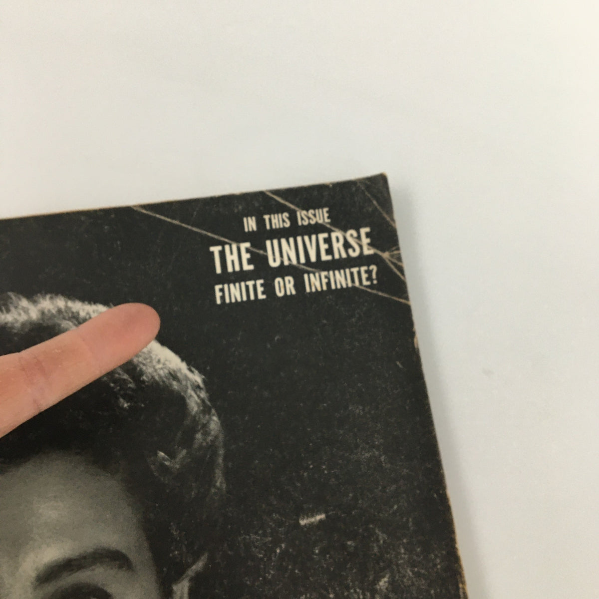 Close-up of the Vintage Life Magazine October 9 1950 cover featuring the caption 'In this issue: The Universe - Finite or Infinite?'. This historic magazine includes a feature on actress Jean Simmons.
