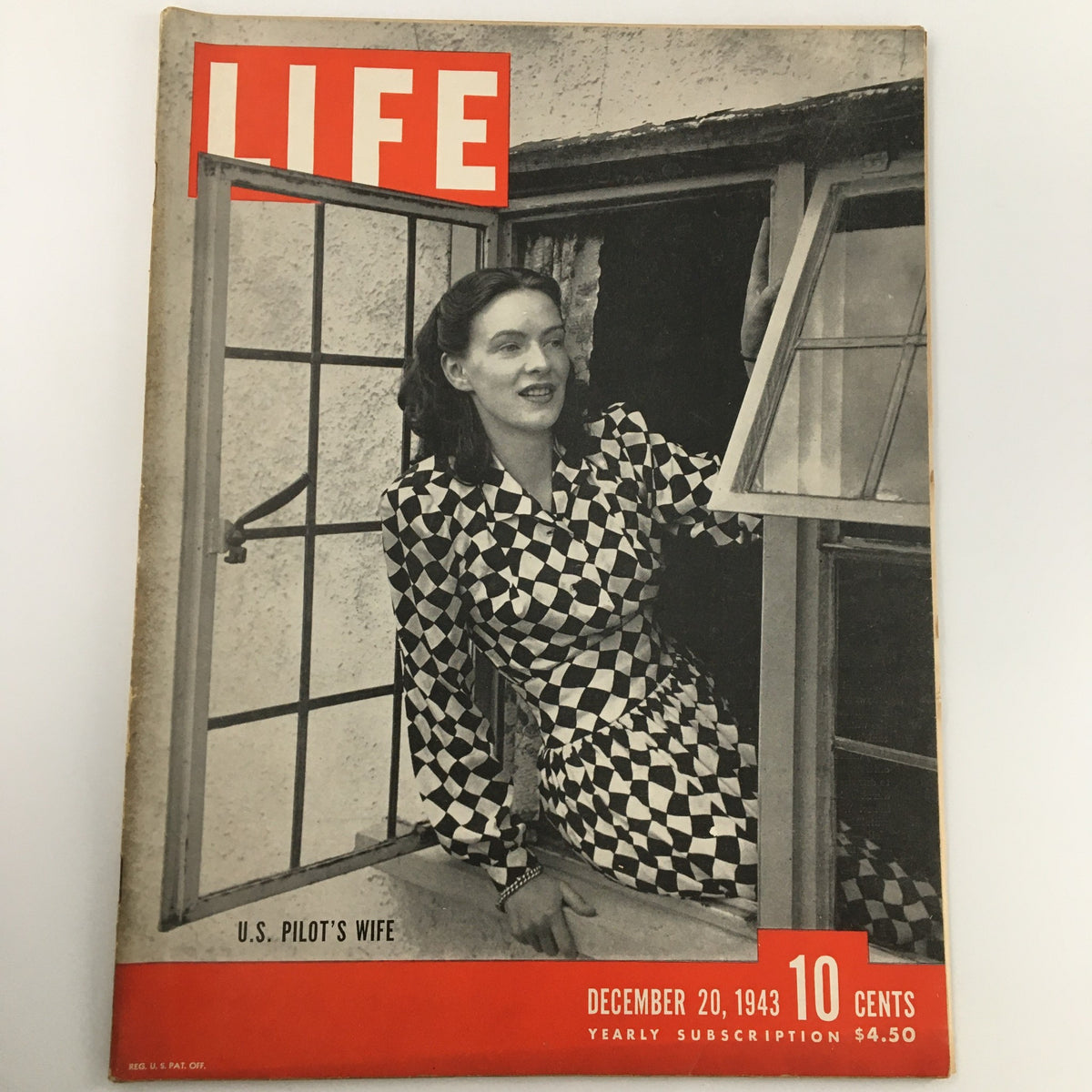 VTG Life Magazine December 20 1943 featuring a striking black and white photograph of a U.S. pilot's wife, showcasing vintage fashion with a checkered dress and an iconic cover design.