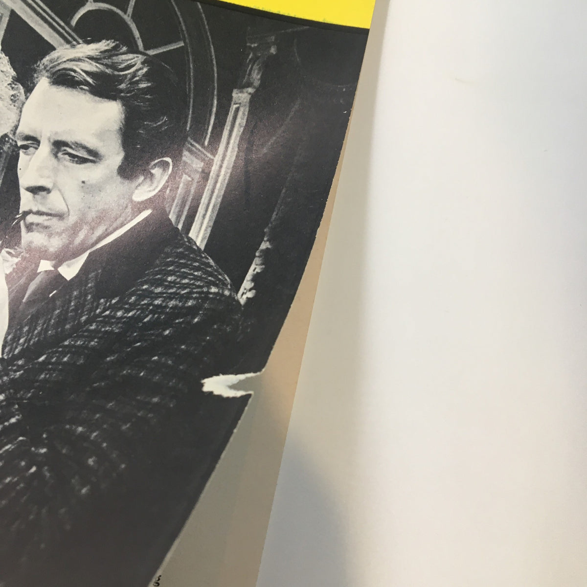 Close-up of the 1965 Playbill for Baker Street, focusing on a male character in a black coat, showcasing the detailed illustration and nostalgic appeal of vintage Broadway memorabilia.
