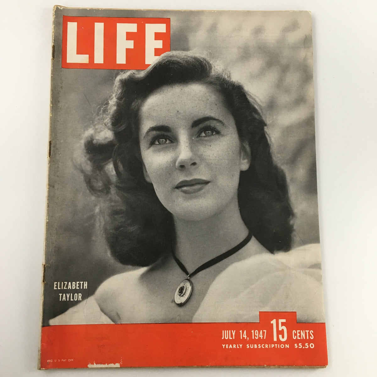 VTG Life Magazine July 14 1947 featuring a young Elizabeth Taylor on the cover, showcasing her timeless beauty against a vintage backdrop.
