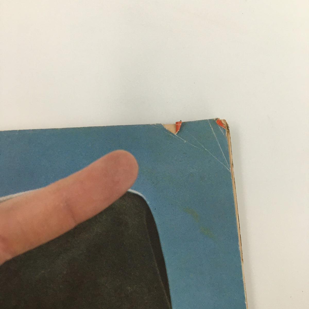 Close-up edge view of VTG Life Magazine dated May 7, 1965, highlighting the wear and minor damage, specifically at the top right corner.
