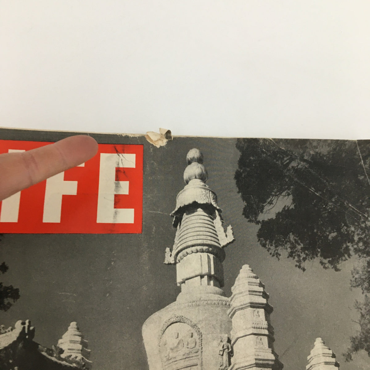 Close-up of Life Magazine cover, April 29, 1946, Peiping, China's Beautiful City in Color, highlighting a damaged corner and detailing the vintage condition.