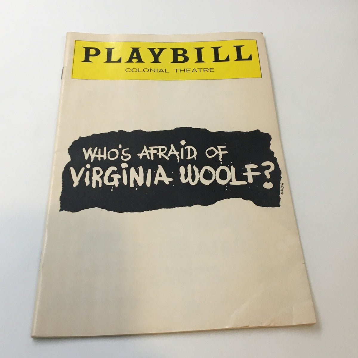 1976 Playbill from The Colonial Theatre, featuring Edward Albee's iconic play 'Who's Afraid of Virginia Woolf?' showcasing a vintage design.