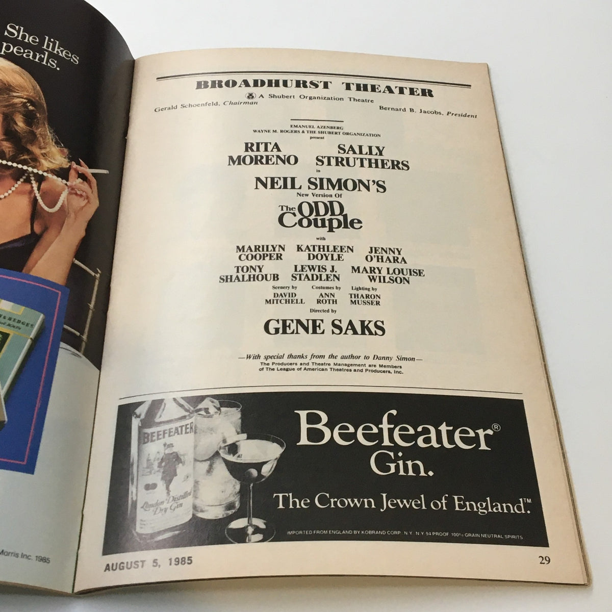 Exterior page of the 1985 Playbill for Neil Simon's The Odd Couple at the Broadhurst Theatre, showcasing cast names and production details.