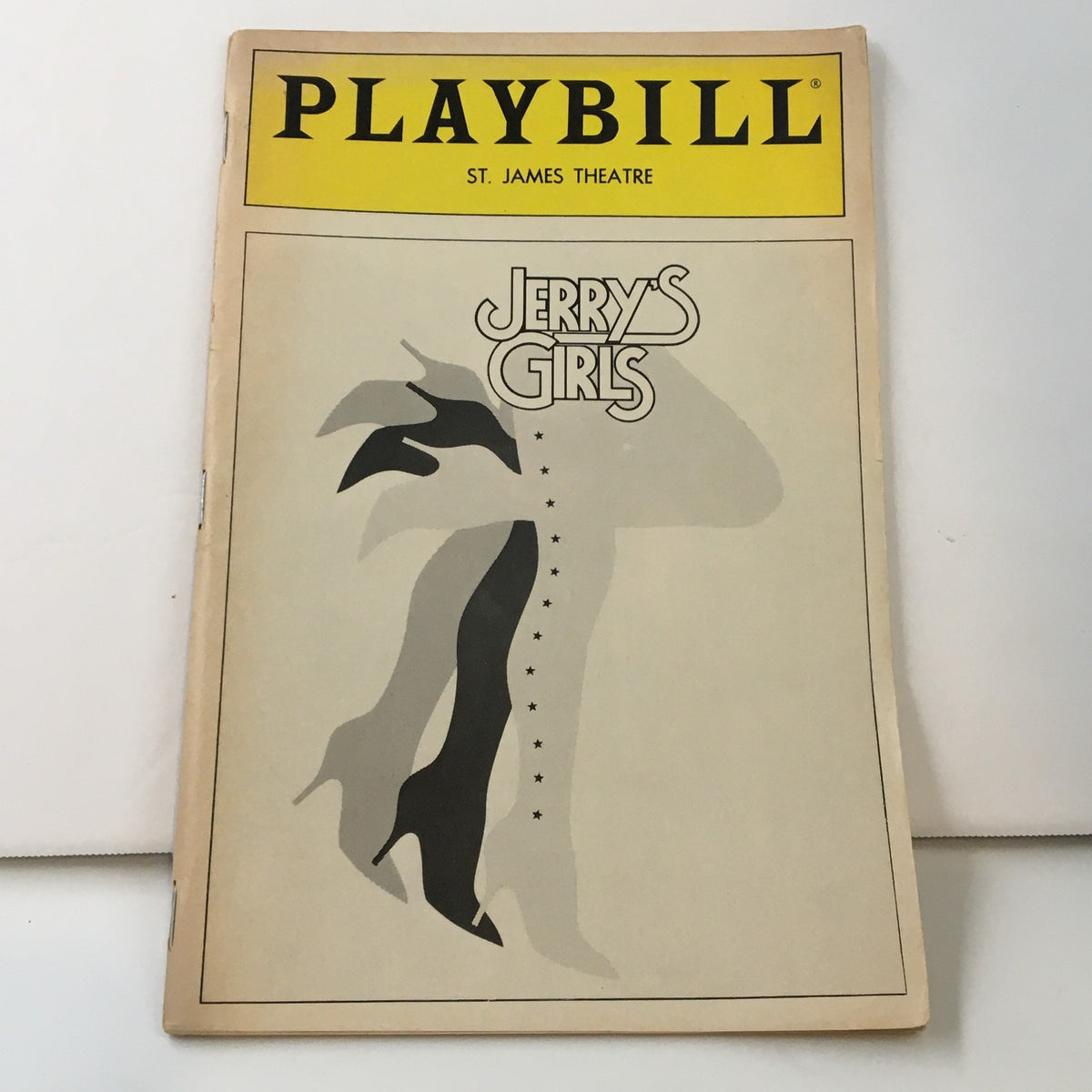 Cover of the 1986 Playbill from St. James Theatre featuring 'Jerry's Girls'. This Playbill highlights Dorothy Loudon in the musical written by Jerry Herman, showcasing the iconic design associated with Broadway memorabilia.