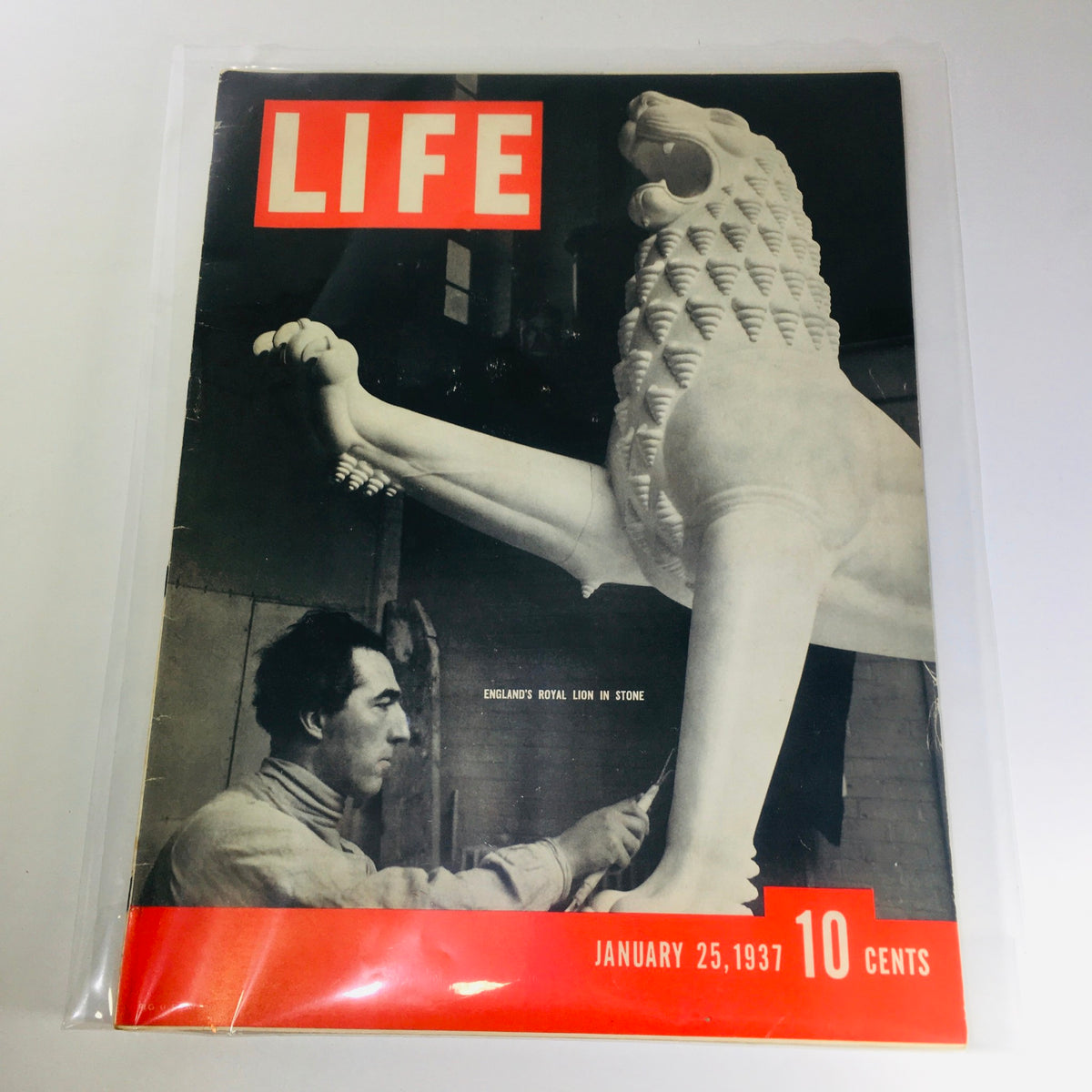 Cover of Vintage Life Magazine dated January 25, 1937, featuring the headline 'England's Royal Lion in Stone,' depicting a sculptor working on a stone lion statue.