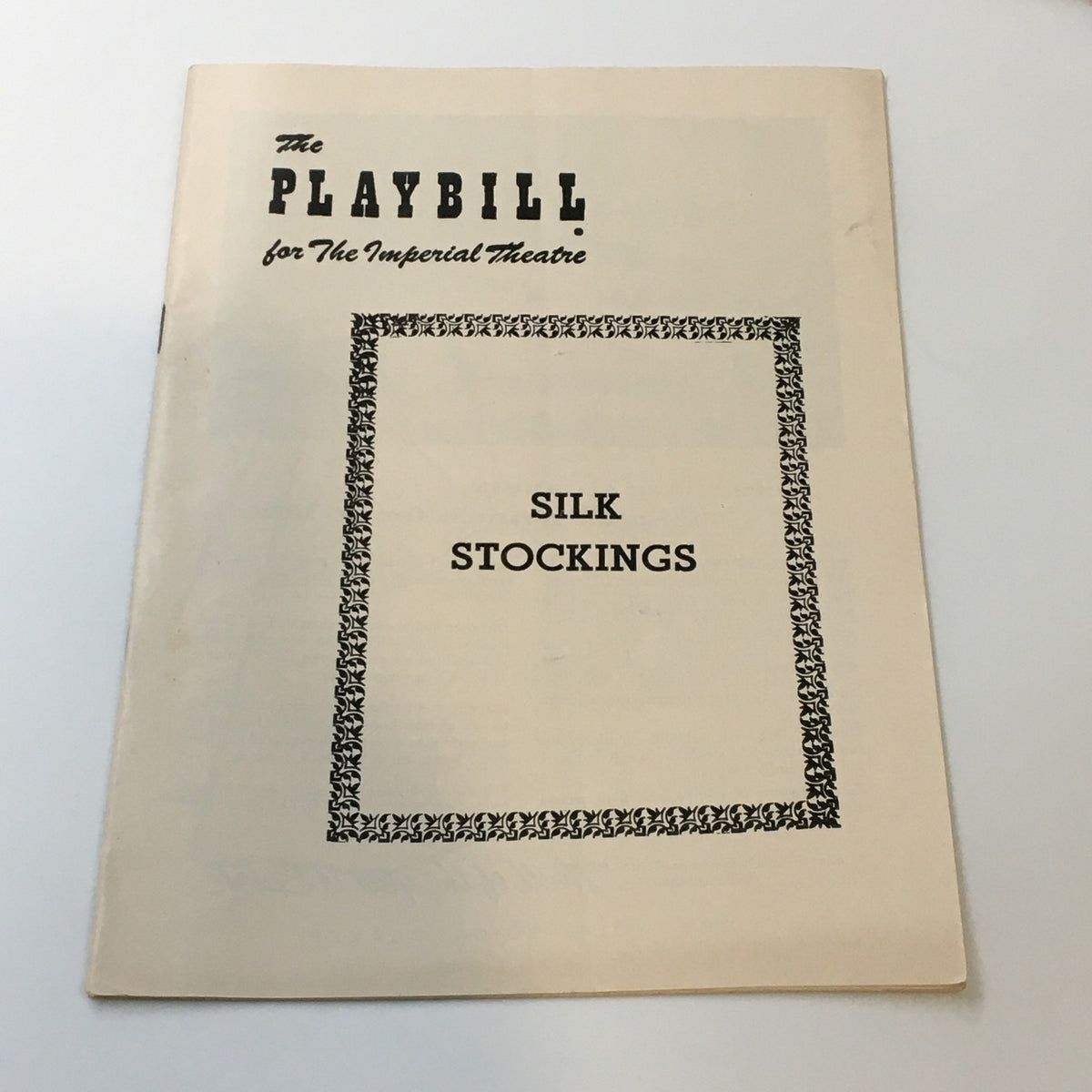 Cover of the 1955 Playbill for Silk Stockings at the Imperial Theatre featuring the title in bold print.