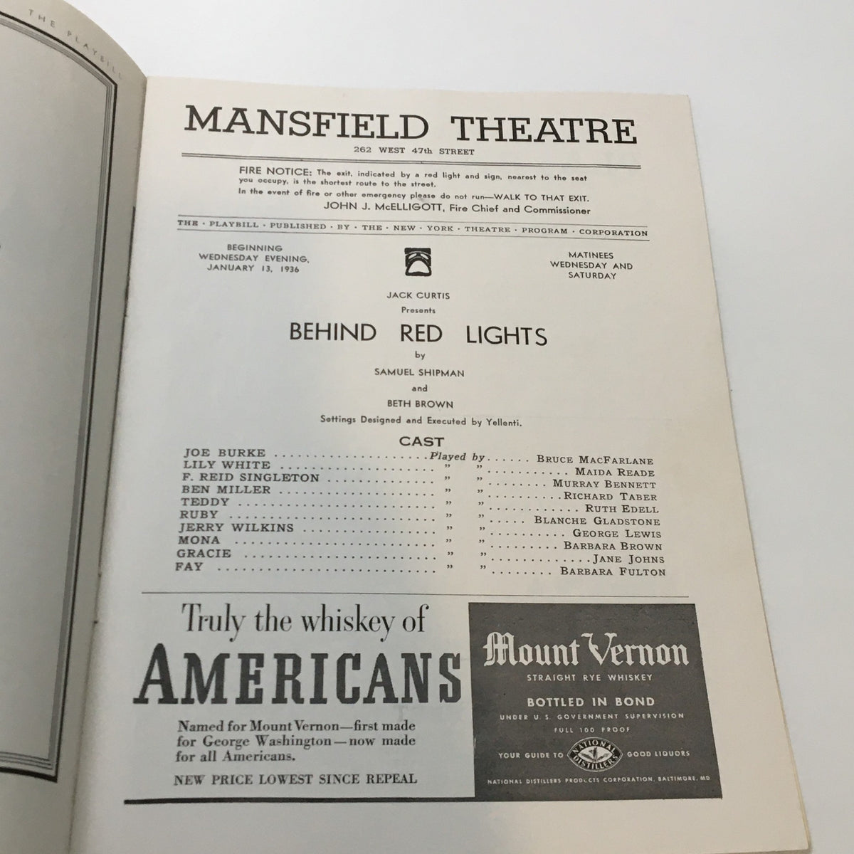 Inside page of the 1936 Playbill for Mansfield Theatre, presenting the cast and details of the play 'Behind Red Lights' by Samuel Shipman, with vintage advertisements.