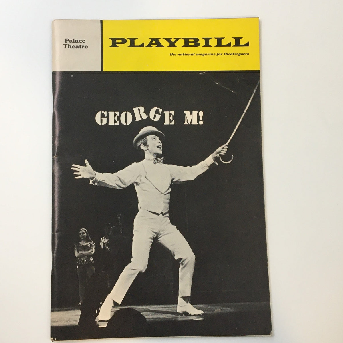 1965 Playbill from The Palace Theatre featuring Joel Grey in the musical George M, showcasing a black and white image of a performer in costume.