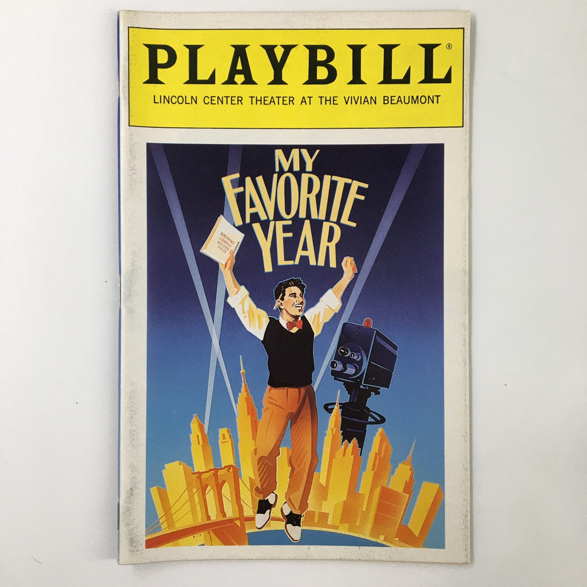 1993 Playbill for My Favorite Year at Lincoln Center Theatre featuring a character in performance attire amidst a city skyline, directed by Ron Lagomarsino.