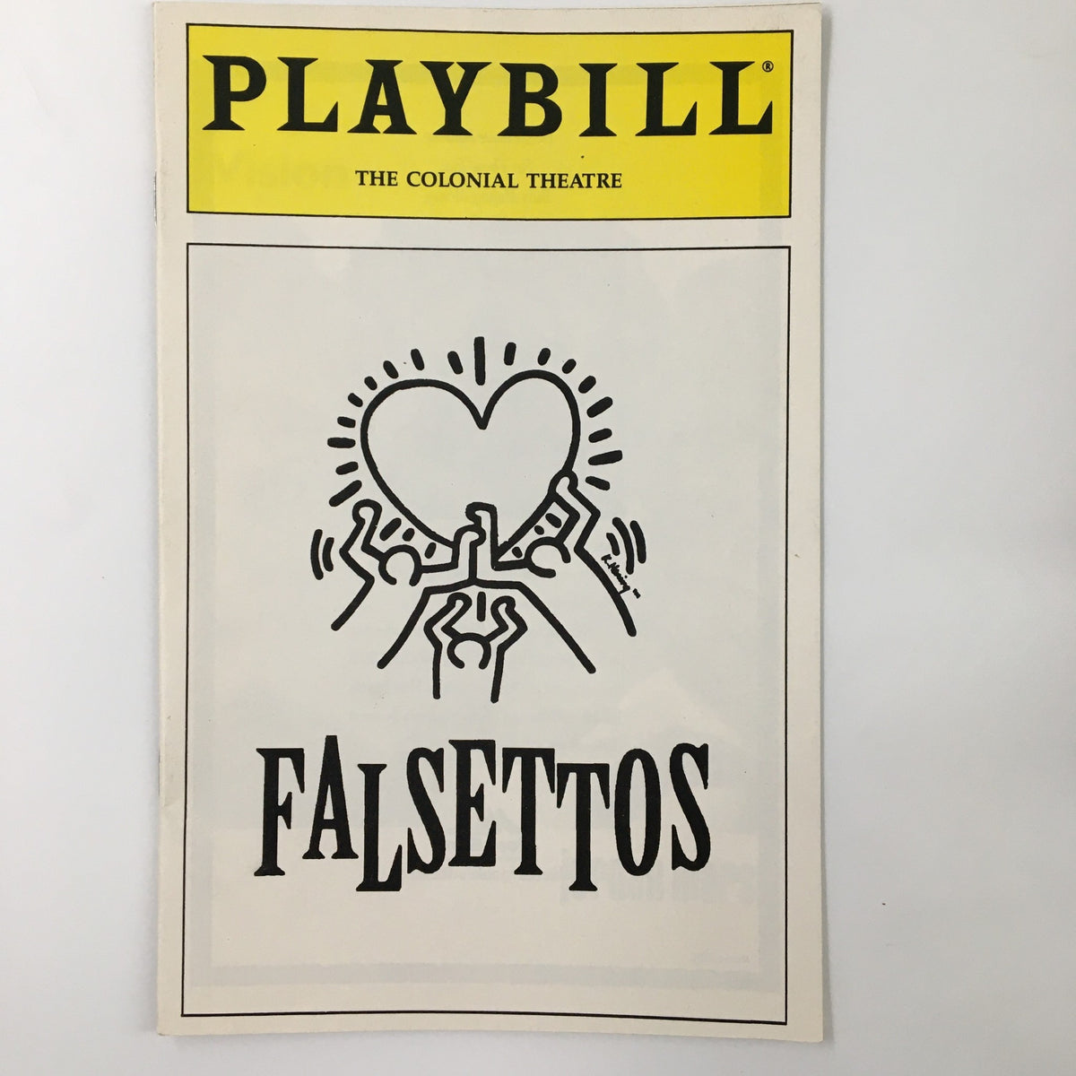 1993 Playbill for Falsettos at the Colonial Theatre featuring a heart and hands artwork, highlighting the groundbreaking musical by William Finn.