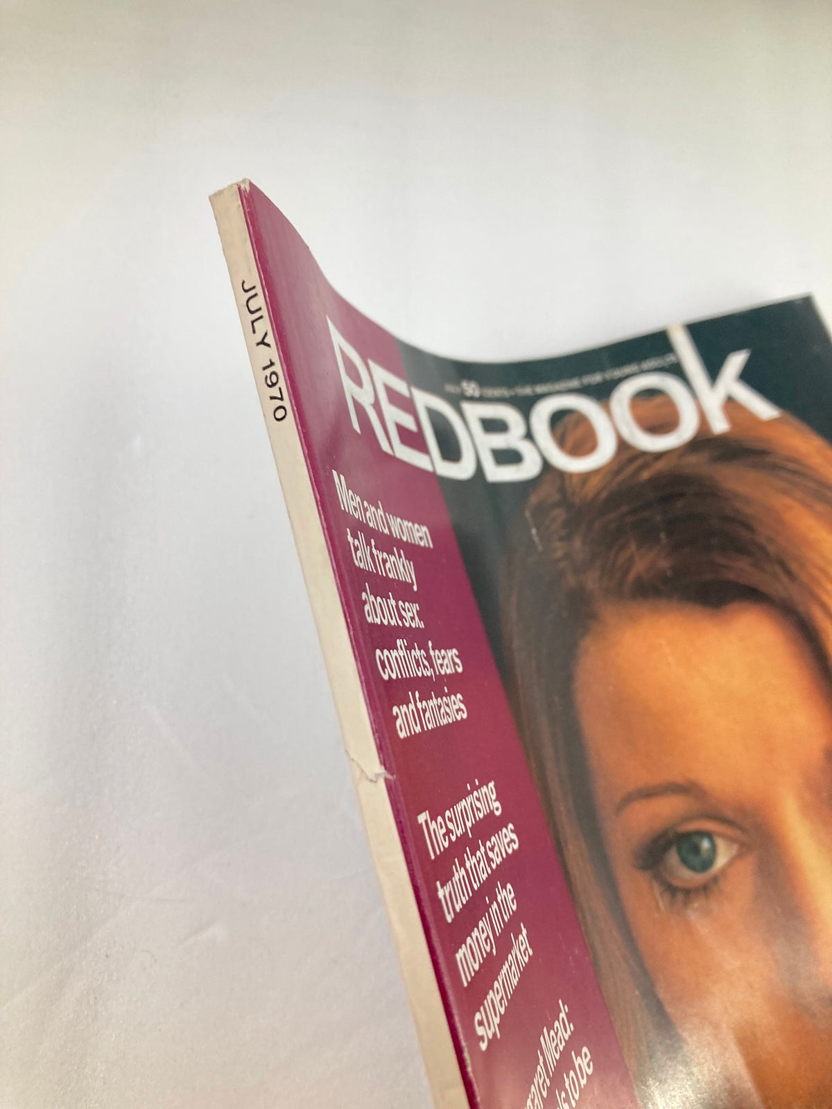 Spine view of the July 1970 issue of VTG Redbook Magazine, showcasing its title and publication date alongside the cover design featuring Sue Quick.