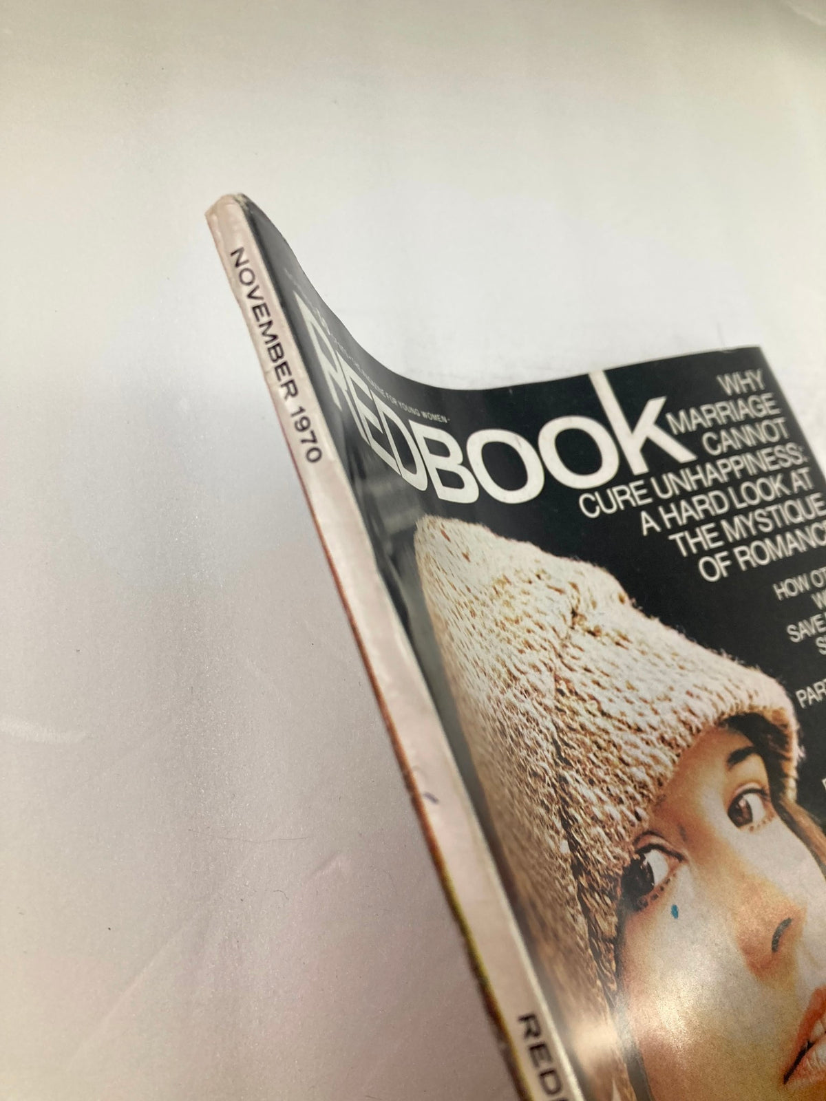 Side view of VTG Redbook Magazine November 1970, highlighting the publication date and the cover photograph of Alva Hellstrom.