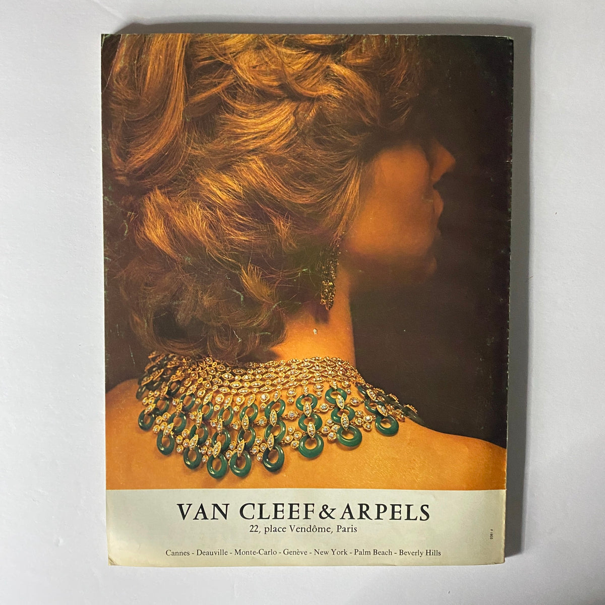 Back cover of a vintage advertisement from Vogue Paris Magazine June - July 1971, promoting Van Cleef & Arpels jewelry, highlighting classic design and elegance.