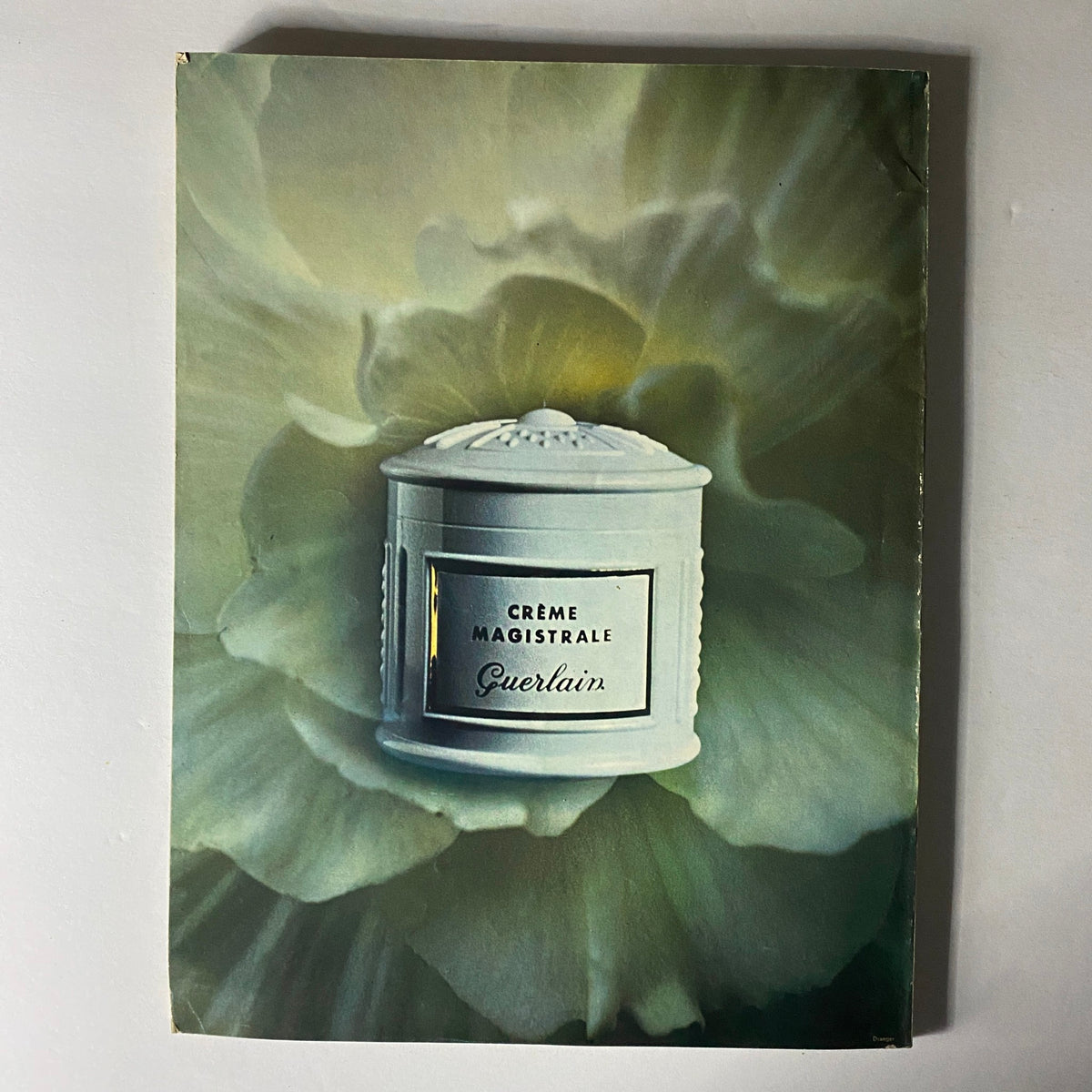 Vintage advertisement for Guerlain's Créme Magistrale featured in Vogue Paris Magazine April 1971.