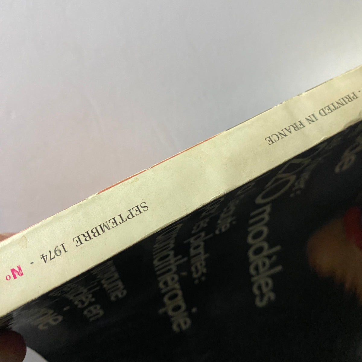 Spine view of the Vogue Paris Magazine September 1974, showing the printed text that indicates publication details.