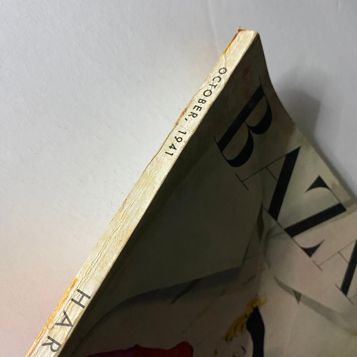 Spine view of Harper's Bazaar Magazine October 1941 showing the publication title and date, highlighting its vintage collectible status.