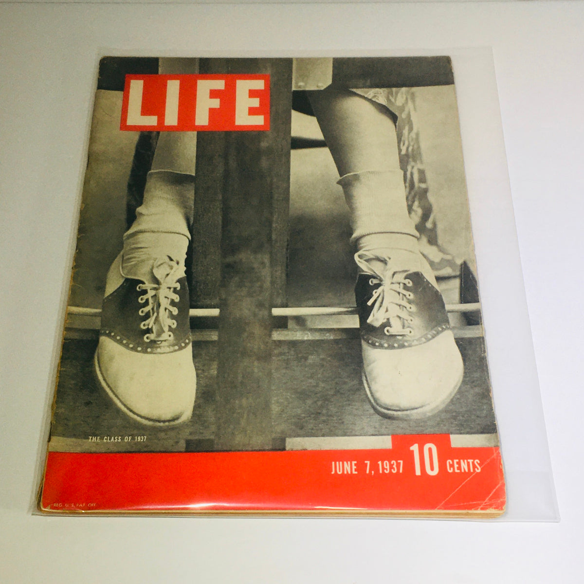 Vintage Life Magazine: The Class of 1937 cover featuring a striking black and white photograph of two feet in shoes, dated June 7, 1937, highlighting its vintage charm for collectors.