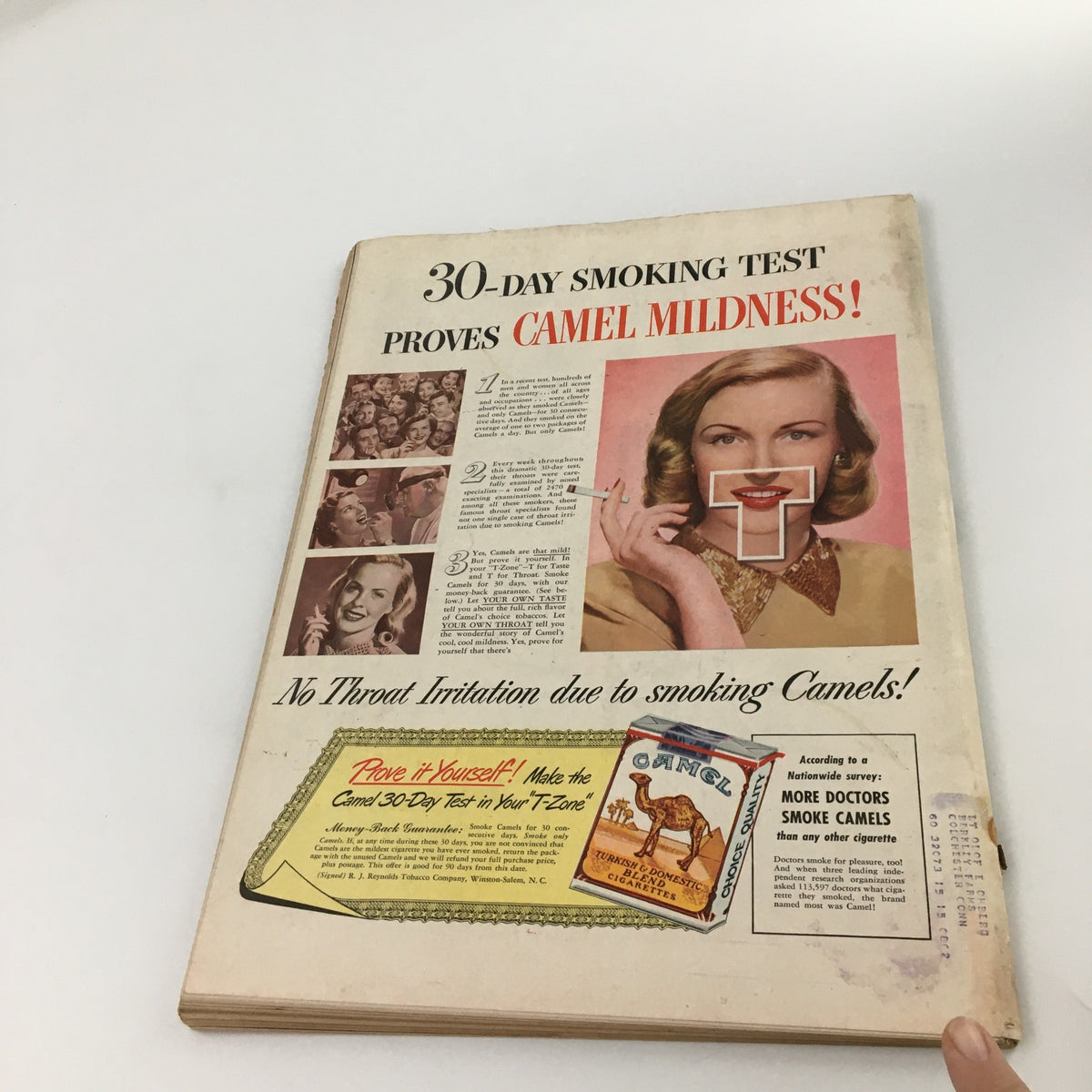 Back cover of Life Magazine December 6, 1948 featuring an advertisement for Camel cigarettes, showcasing a model promoting camel mildness.