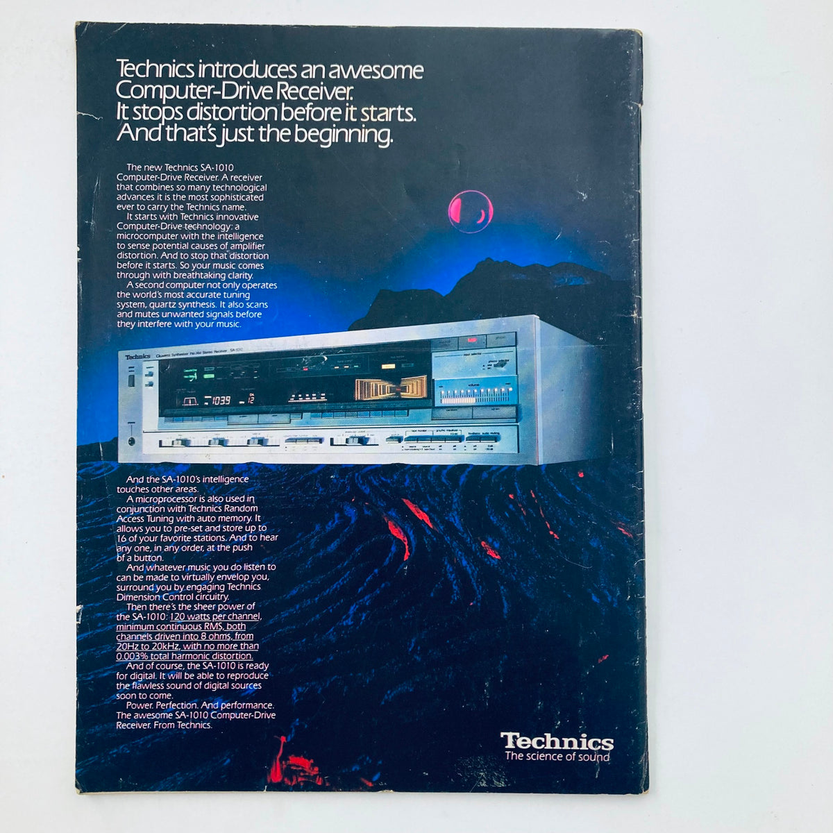 Back cover of the Vintage National Lampoon Magazine January 1984, advertising Technics SA-1010 Computer-Drive Receiver with detailed descriptions of its technological innovations.