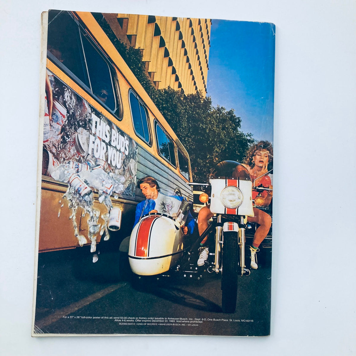 Back cover of the Vintage National Lampoon Magazine July 1983 Vol 2 No. 60 featuring a witty Budweiser advertisement with a playful scene.