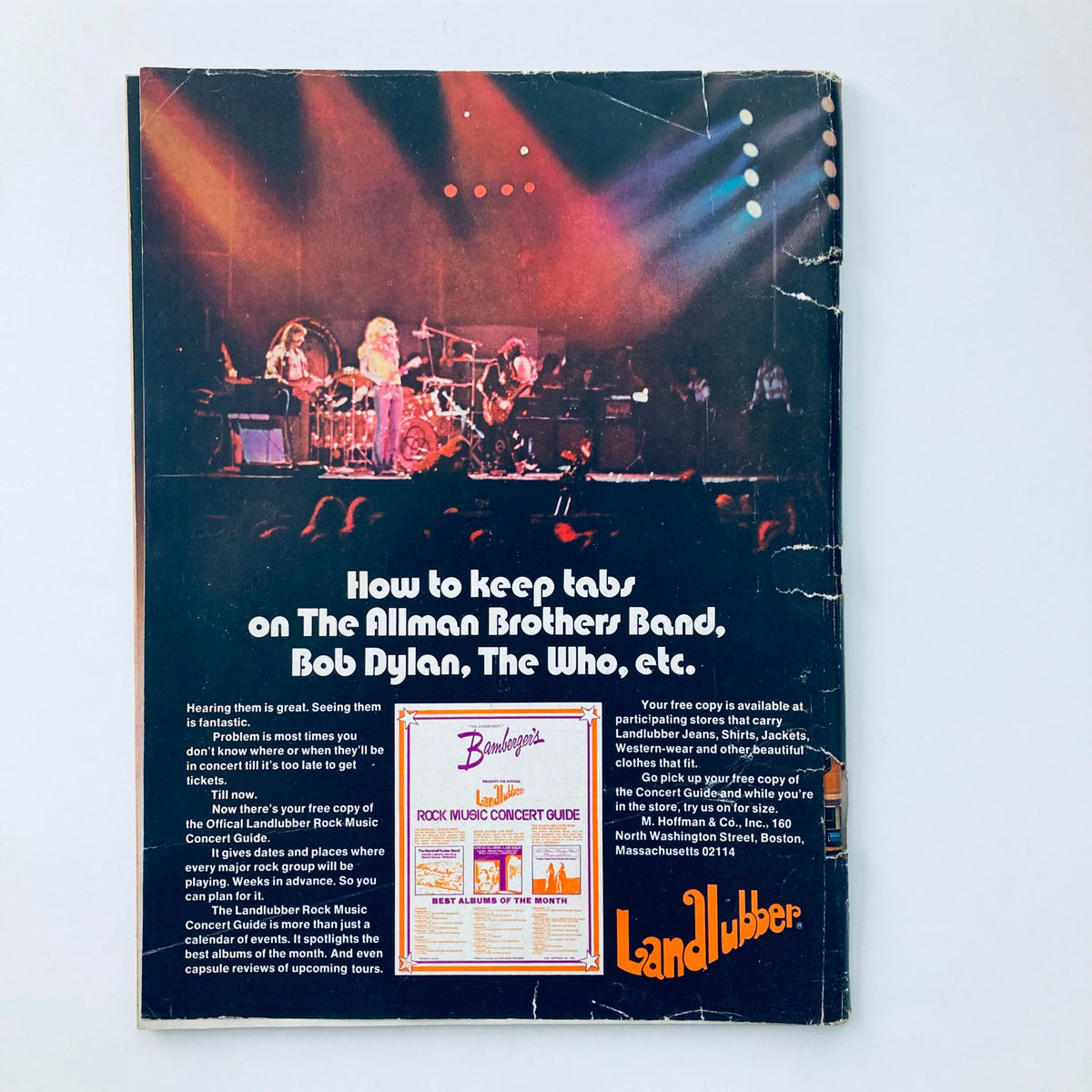 Back cover of Vtg National Lampoon Magazine March 1974 featuring a concert scene picture and an advertisement for a music concert guide, encapsulating the era's music culture.