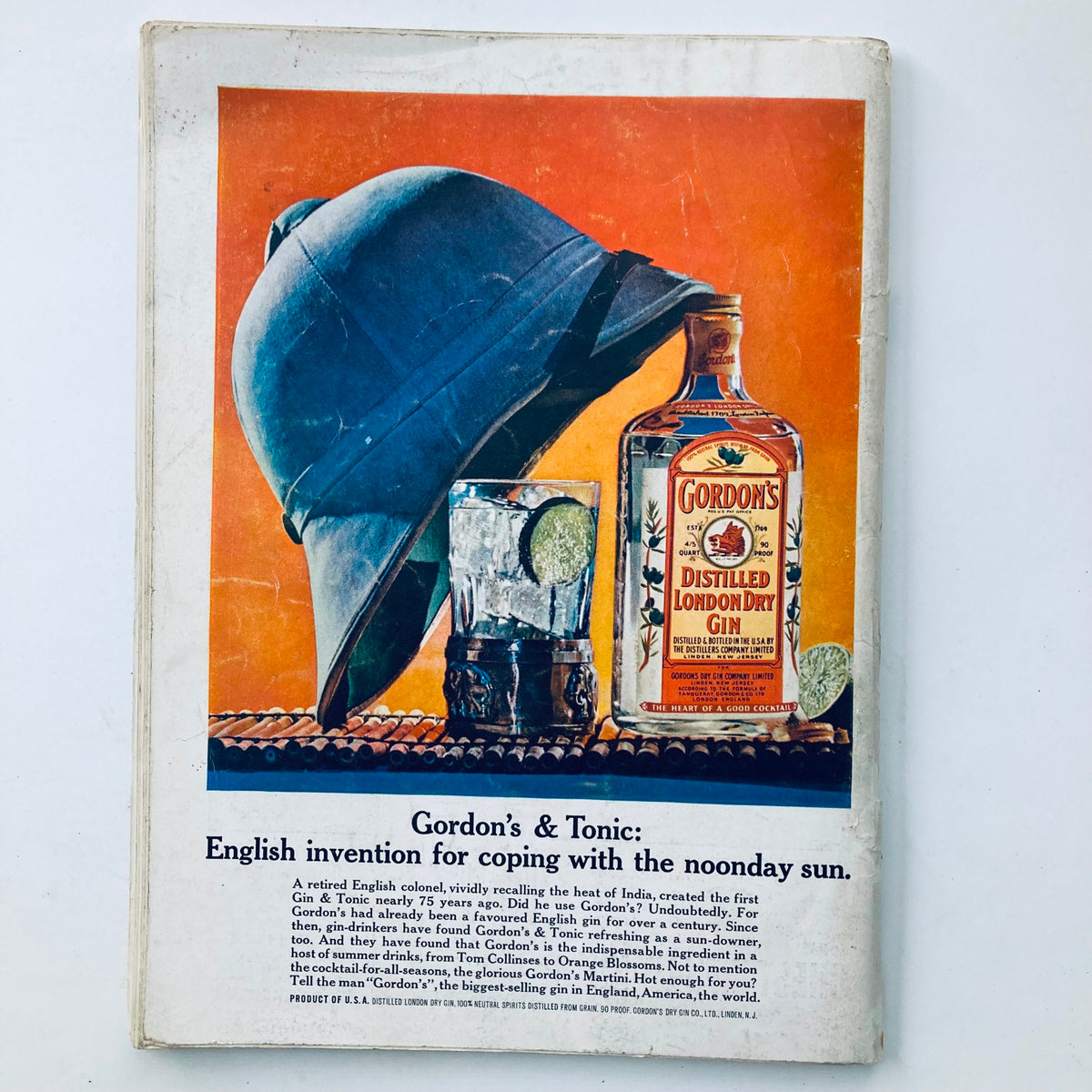Back cover of the vintage Playboy magazine June 1963 showcasing a colorful advertisement for Gordon's Gin featuring a helmet and refreshing drink.