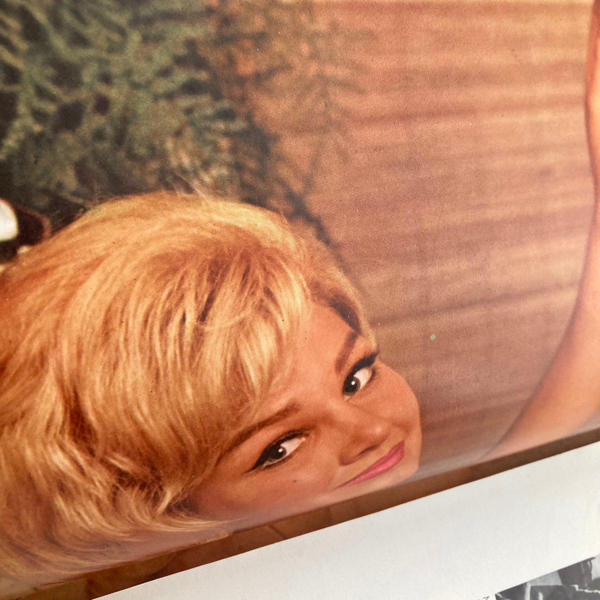 VTG Playboy Magazine March 1963 featuring Playmate Adrienne Moreau with a captivating vintage image of her smiling, showcasing the retro charm of the magazine.